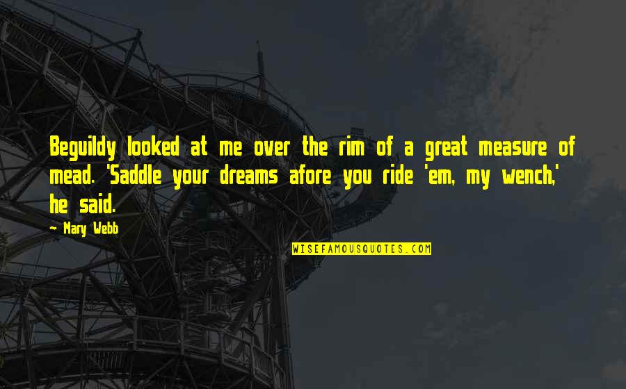 Ride Me Quotes By Mary Webb: Beguildy looked at me over the rim of Ride Me Quotes By Mary Webb: Beguildy looked at me over the rim of
