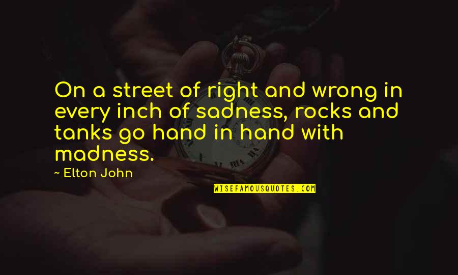 Rocks Quotes By Elton John: On a street of right and wrong in