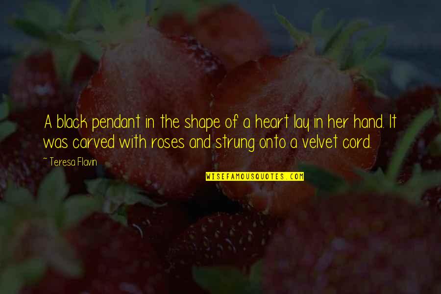 Roses With Quotes By Teresa Flavin: A black pendant in the shape of a