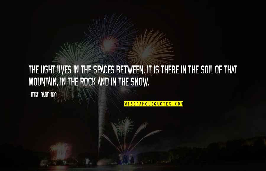 Sad Grunge Quotes By Leigh Bardugo: The light lives in the spaces between. It Sad Grunge Quotes By Leigh Bardugo: The light lives in the spaces between. It