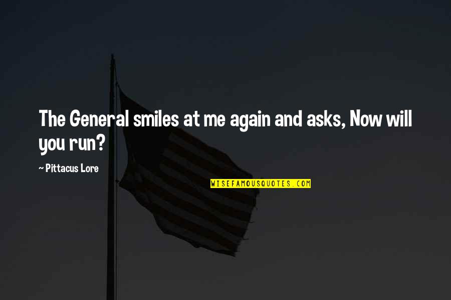 Saebostep Quotes By Pittacus Lore: The General smiles at me again and asks, Saebostep Quotes By Pittacus Lore: The General smiles at me again and asks,