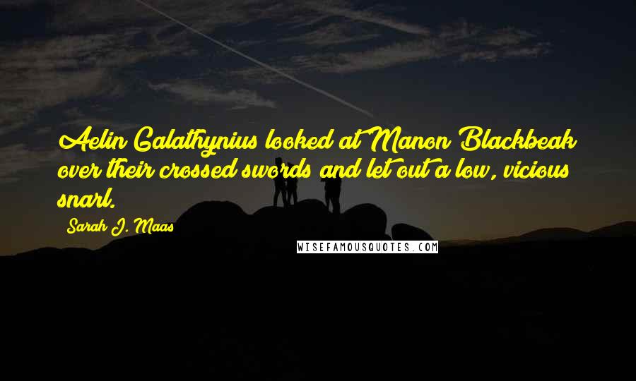 Sarah J. Maas quotes: Aelin Galathynius looked at Manon Blackbeak over their crossed swords and let out a low, vicious snarl.