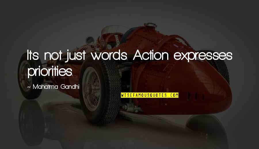 Schmitz Quotes By Mahatma Gandhi: It's not just words. Action expresses priorities.