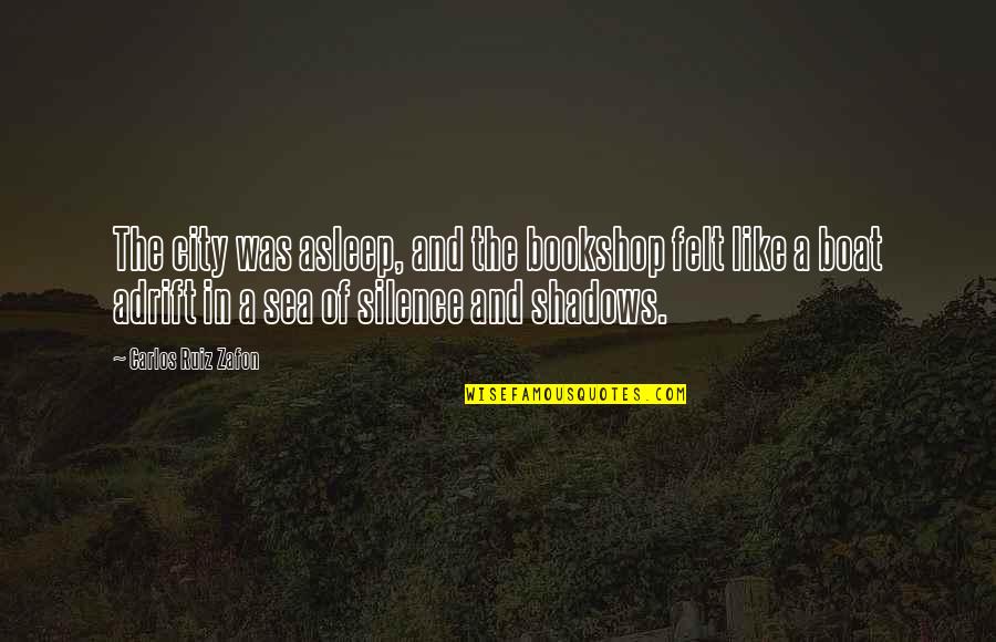 Sea Description Quotes By Carlos Ruiz Zafon: The city was asleep, and the bookshop felt Sea Description Quotes By Carlos Ruiz Zafon: The city was asleep, and the bookshop felt