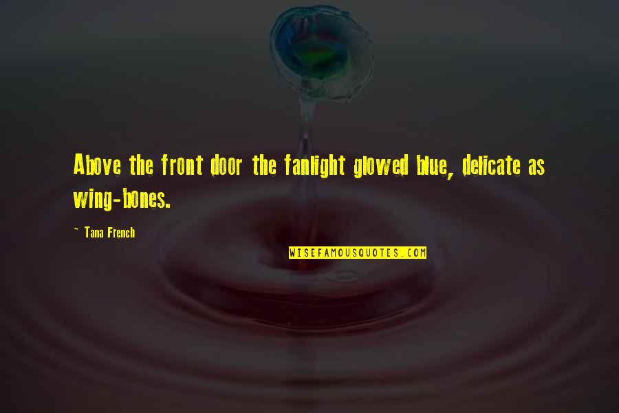 Seeks Attention Quotes By Tana French: Above the front door the fanlight glowed blue,