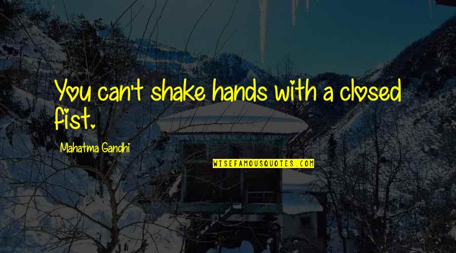 Shake It Off Quotes By Mahatma Gandhi: You can't shake hands with a closed fist.