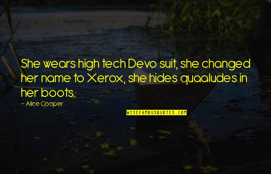 She Hides Quotes By Alice Cooper: She wears high tech Devo suit, she changed