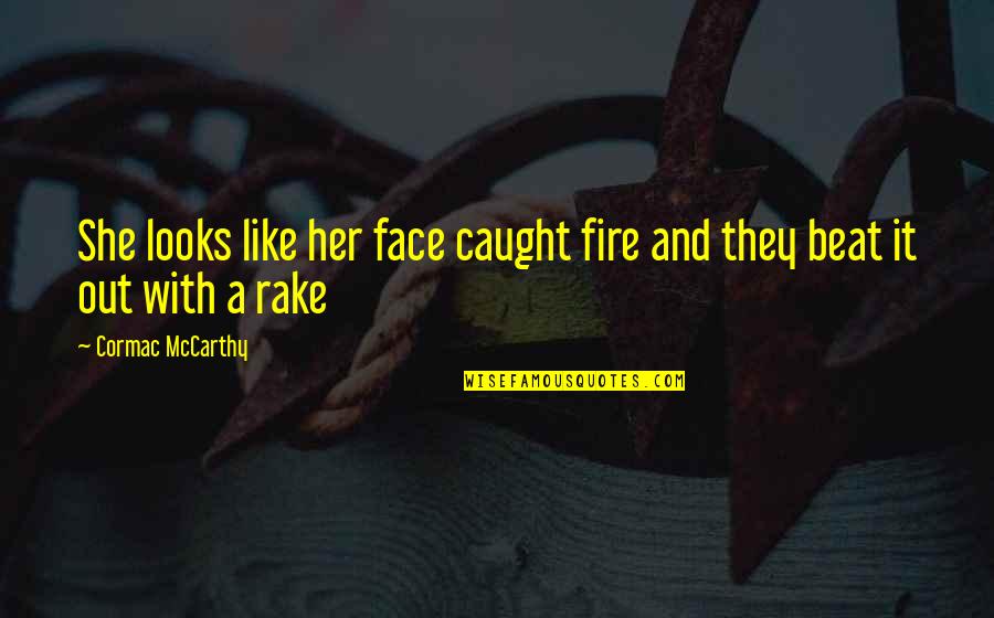 She Is Fire Quotes By Cormac McCarthy: She looks like her face caught fire and
