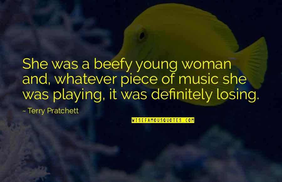 She Scares Me Quotes By Terry Pratchett: She was a beefy young woman and, whatever She Scares Me Quotes By Terry Pratchett: She was a beefy young woman and, whatever