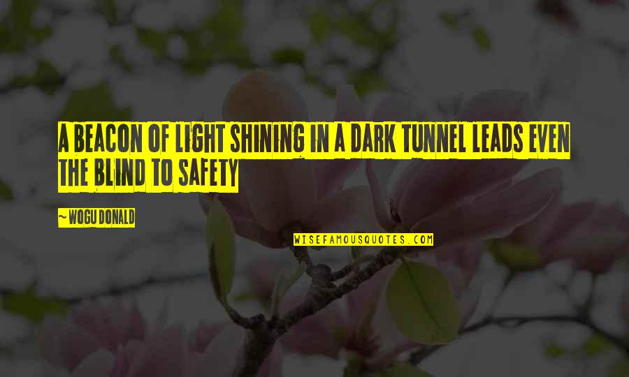 Shining Light Inspirational Quotes By Wogu Donald: A beacon of light shining in a dark
