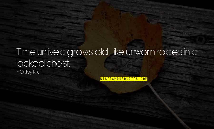 Simile Quotes By Oktay Rifat: Time unlived grows old Like unworn robes in