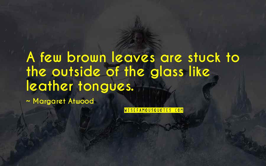 Singurul Lac Quotes By Margaret Atwood: A few brown leaves are stuck to the