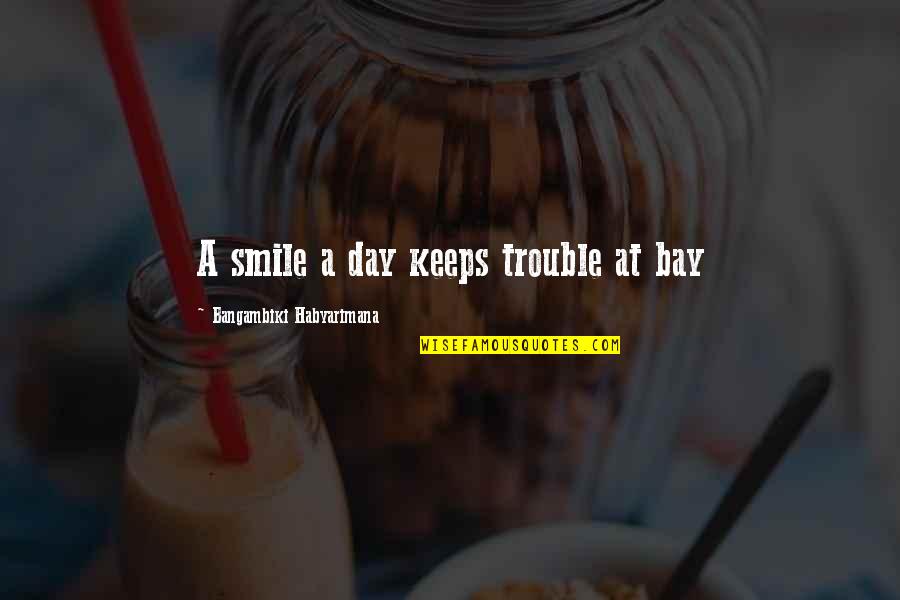 Smile A Day Quotes By Bangambiki Habyarimana: A smile a day keeps trouble at bay