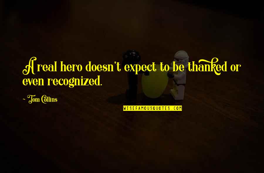 Smiley Face Funny Wallpaper With Quotes By Tom Collins: A real hero doesn't expect to be thanked