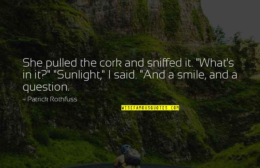 Sniffed Quotes By Patrick Rothfuss: She pulled the cork and sniffed it. "What's