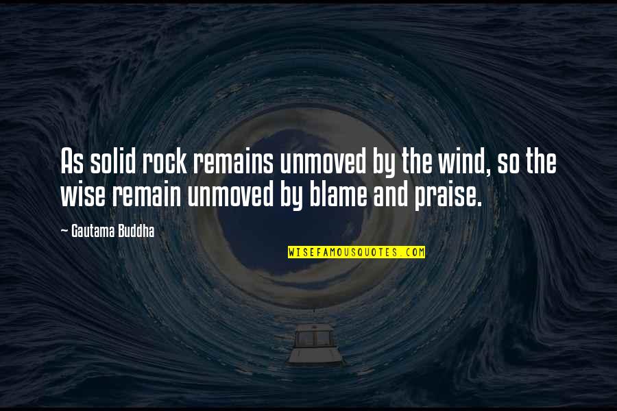 Solid As A Rock Quotes By Gautama Buddha: As solid rock remains unmoved by the wind,