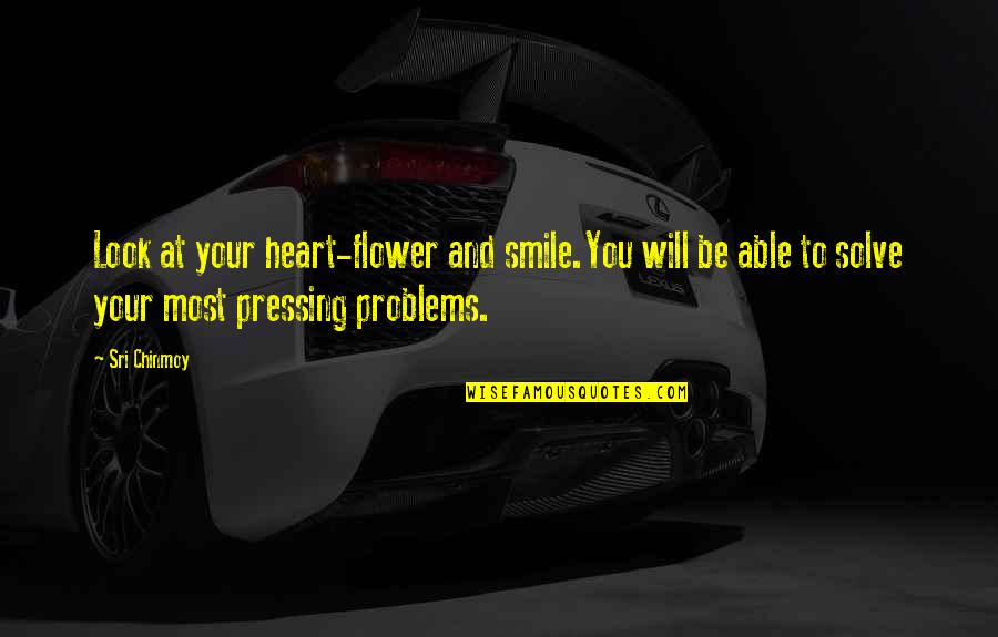 Solving Problems Quotes By Sri Chinmoy: Look at your heart-flower and smile.You will be