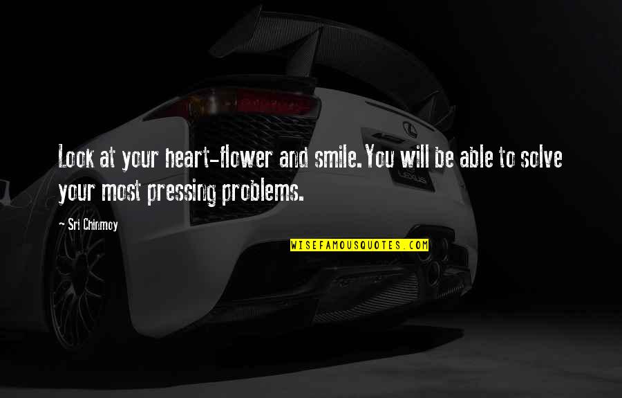 Solving Your Problems Quotes By Sri Chinmoy: Look at your heart-flower and smile.You will be