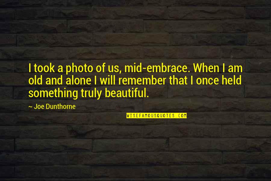 Something Beautiful Quotes By Joe Dunthorne: I took a photo of us, mid-embrace. When