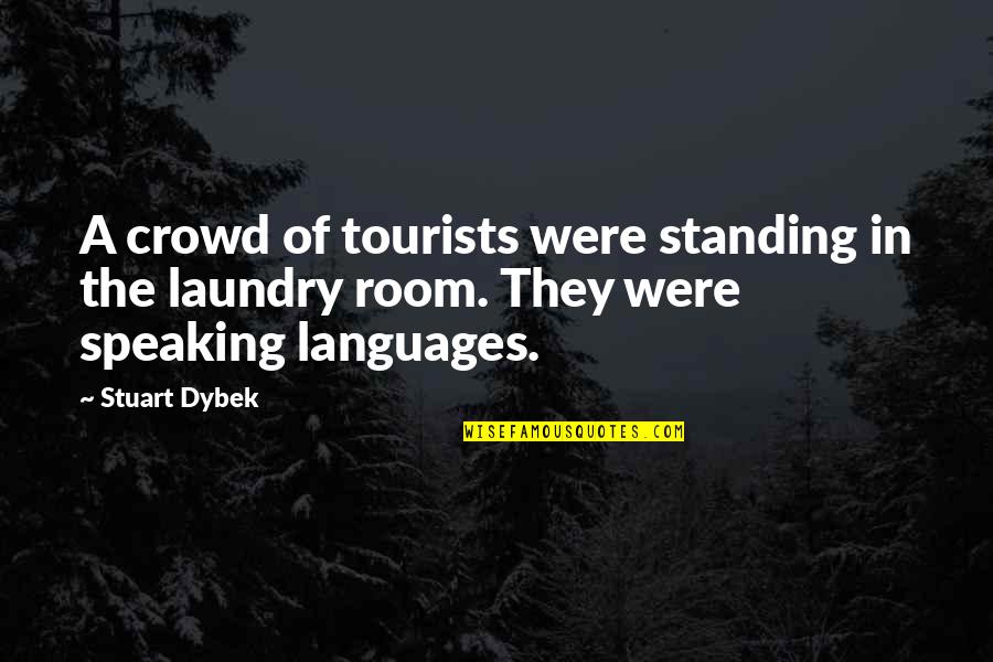 Speaking 2 Languages Quotes By Stuart Dybek: A crowd of tourists were standing in the