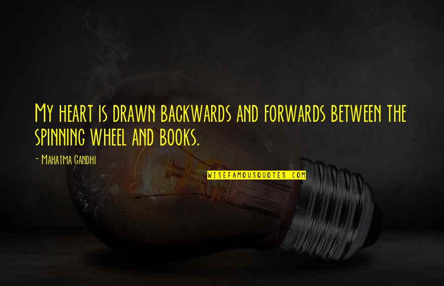 Spinning Wheel Quotes By Mahatma Gandhi: My heart is drawn backwards and forwards between