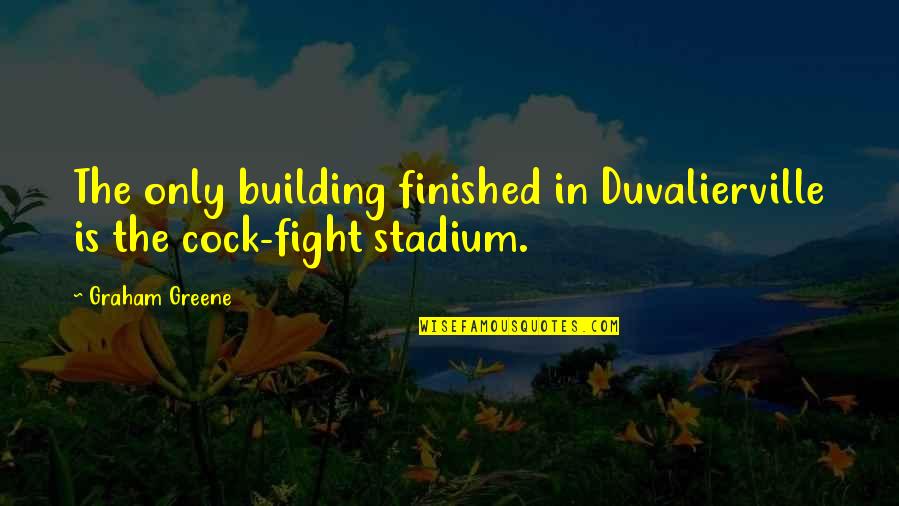 Stadium Quotes By Graham Greene: The only building finished in Duvalierville is the