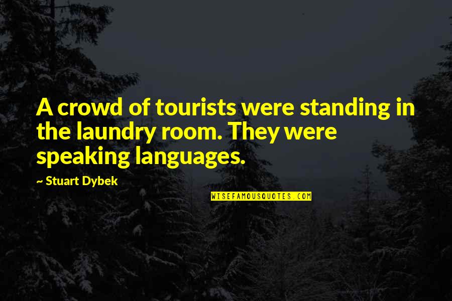 Standing Out From The Crowd Quotes By Stuart Dybek: A crowd of tourists were standing in the