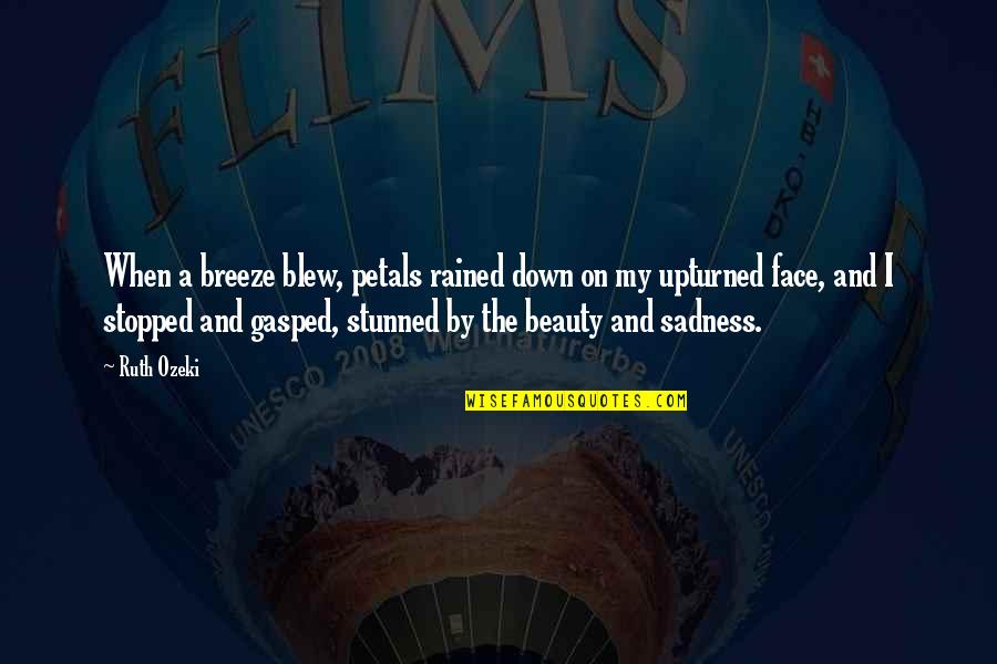 Stunned Face Quotes By Ruth Ozeki: When a breeze blew, petals rained down on