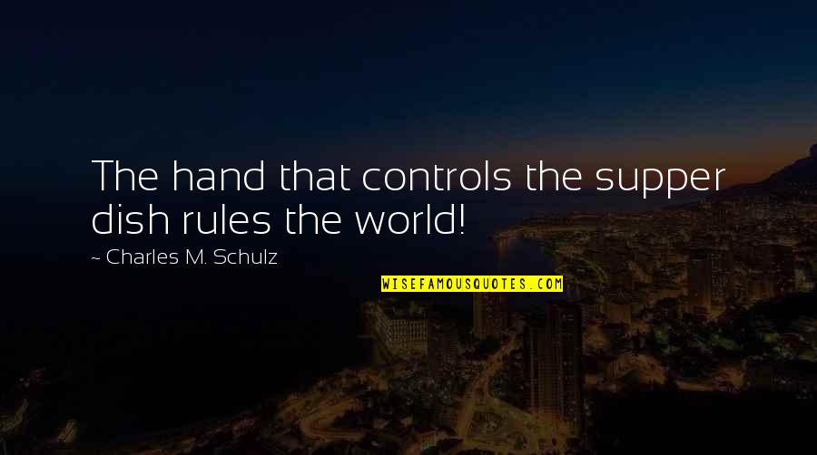 Supper's Quotes By Charles M. Schulz: The hand that controls the supper dish rules