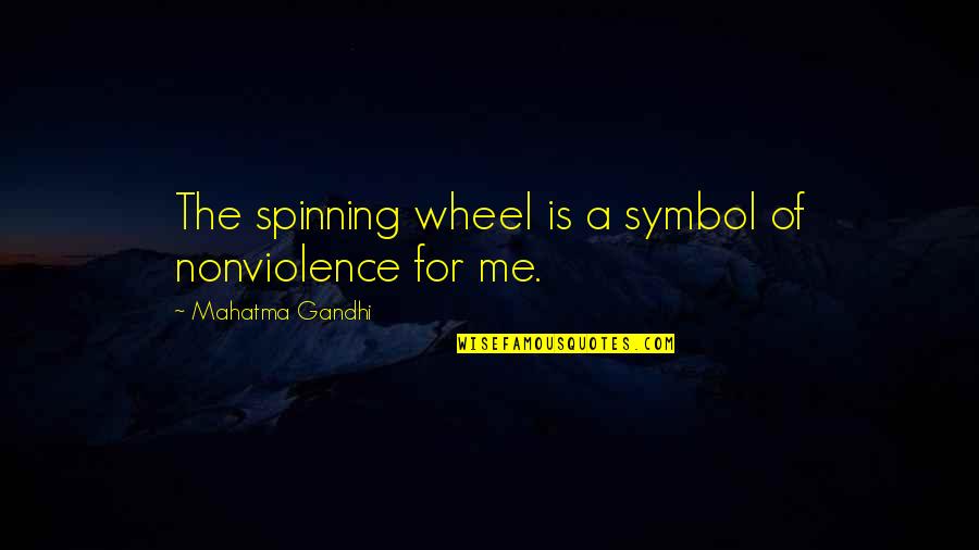 Symbols Quotes By Mahatma Gandhi: The spinning wheel is a symbol of nonviolence