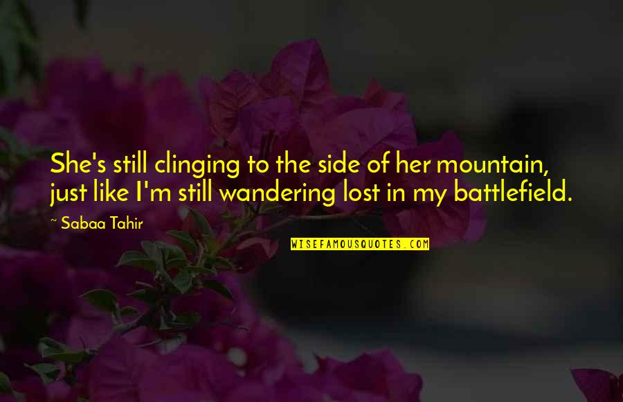 Tahir Quotes By Sabaa Tahir: She's still clinging to the side of her Tahir Quotes By Sabaa Tahir: She's still clinging to the side of her