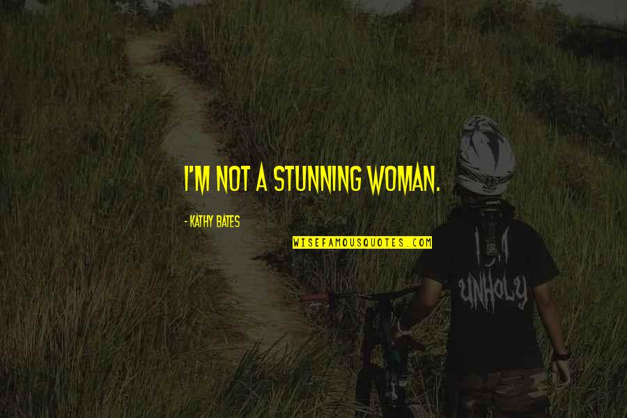 Tamilan Quotes By Kathy Bates: I'm not a stunning woman.