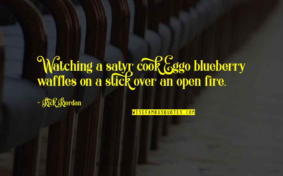 The Eyfs Quotes By Rick Riordan: Watching a satyr cook Eggo blueberry waffles on