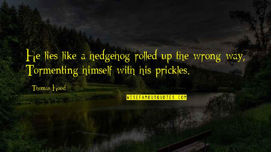 The Hedgehog Quotes By Thomas Hood: He lies like a hedgehog rolled up the