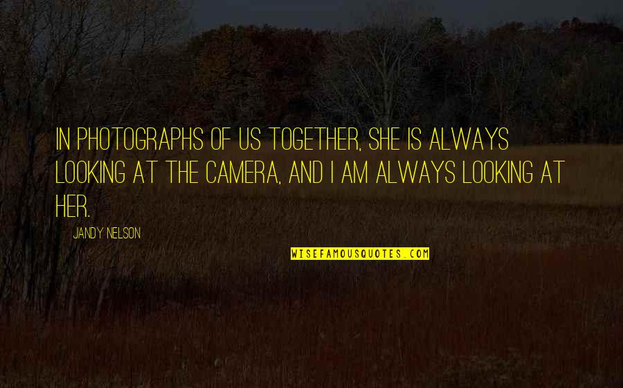 The Love Of The Beautiful Quotes By Jandy Nelson: In photographs of us together, she is always The Love Of The Beautiful Quotes By Jandy Nelson: In photographs of us together, she is always