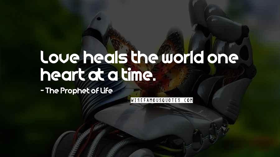 The Prophet Of Life quotes: Love heals the world one heart at a time.