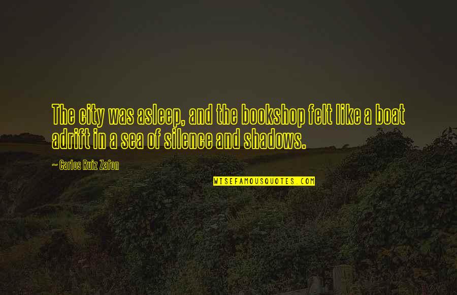 The Sea And The Silence Quotes By Carlos Ruiz Zafon: The city was asleep, and the bookshop felt