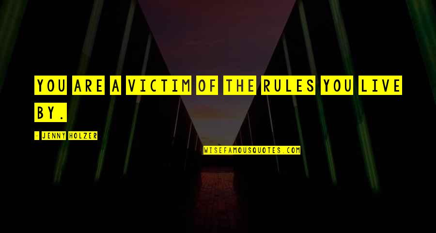 The Universal Law Of Attraction Quotes By Jenny Holzer: You are a victim of the rules you