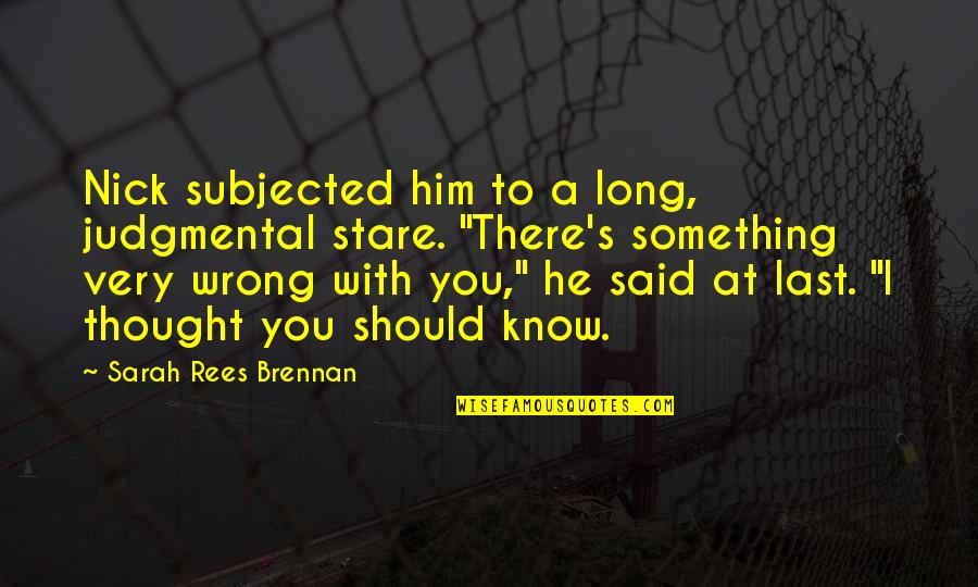 There Something Him Quotes By Sarah Rees Brennan: Nick subjected him to a long, judgmental stare.