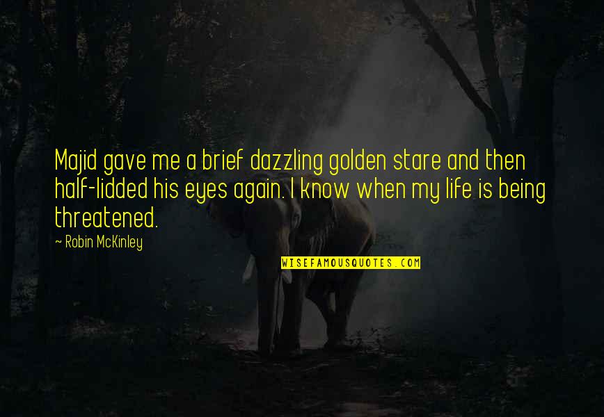 Threatened By Me Quotes By Robin McKinley: Majid gave me a brief dazzling golden stare