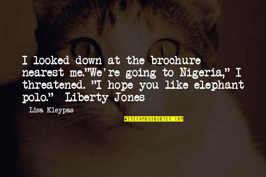Threatened Quotes By Lisa Kleypas: I looked down at the brochure nearest me."We're Threatened Quotes By Lisa Kleypas: I looked down at the brochure nearest me."We're