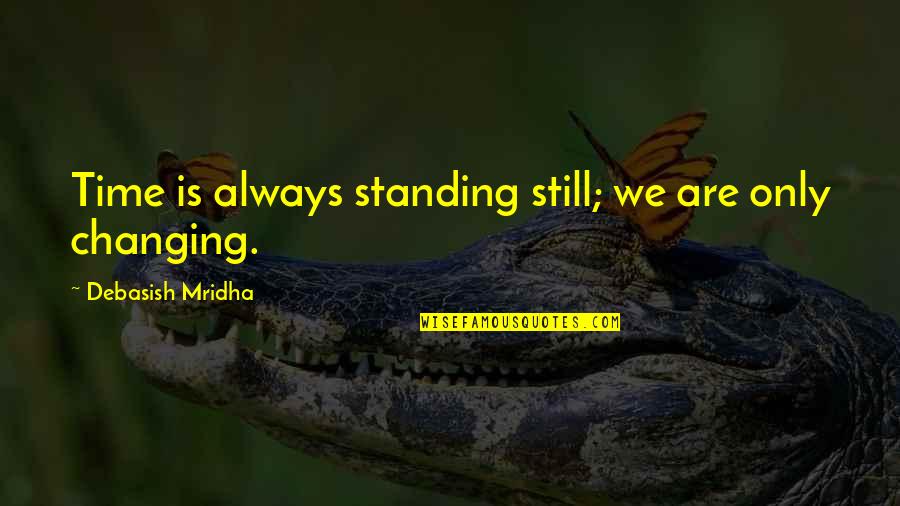 Time Not Changing Quotes By Debasish Mridha: Time is always standing still; we are only
