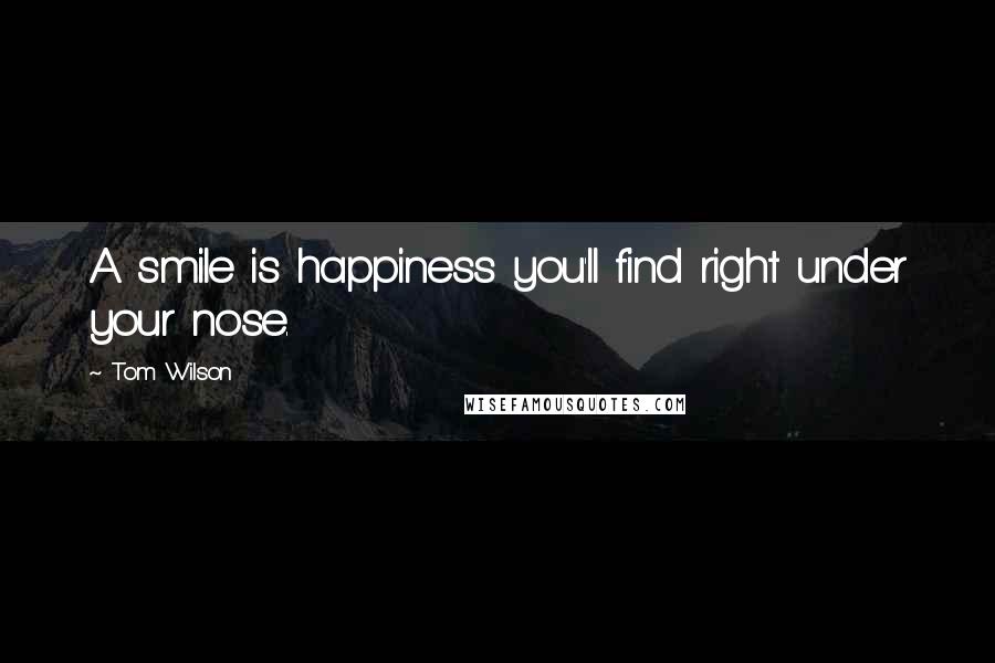 Tom Wilson quotes: A smile is happiness you'll find right under your nose.