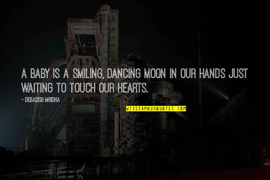 Touch A Heart Quotes By Debasish Mridha: A baby is a smiling, dancing moon in