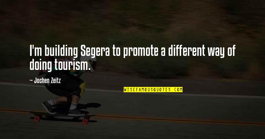Tourism Quotes By Jochen Zeitz: I'm building Segera to promote a different way