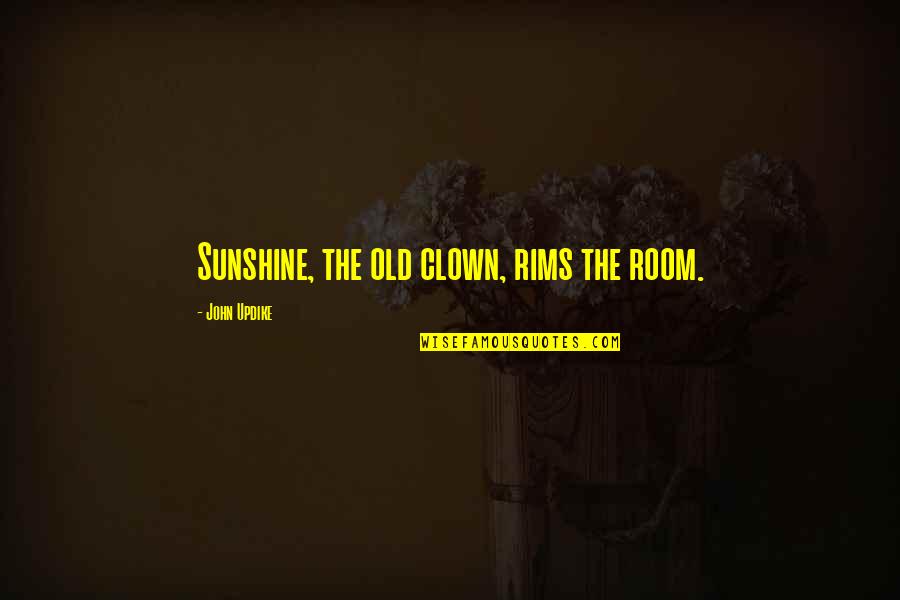 Traditionalistic Subculture Quotes By John Updike: Sunshine, the old clown, rims the room.