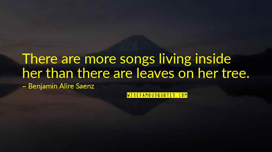 Tree Without Leaves Quotes By Benjamin Alire Saenz: There are more songs living inside her than