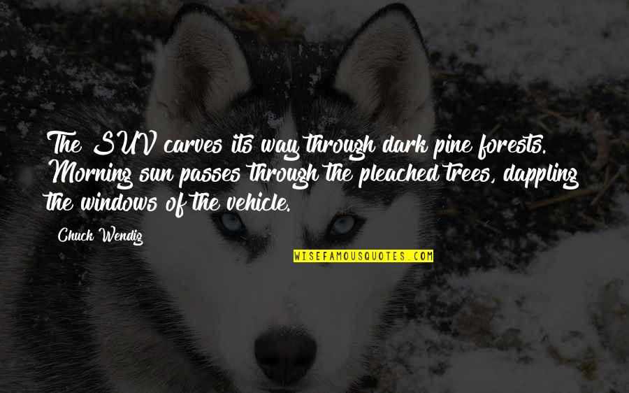 Trees And Sun Quotes By Chuck Wendig: The SUV carves its way through dark pine