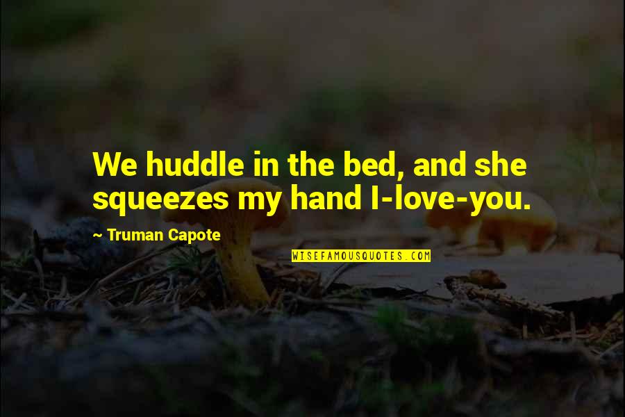 Truman Quotes By Truman Capote: We huddle in the bed, and she squeezes Truman Quotes By Truman Capote: We huddle in the bed, and she squeezes