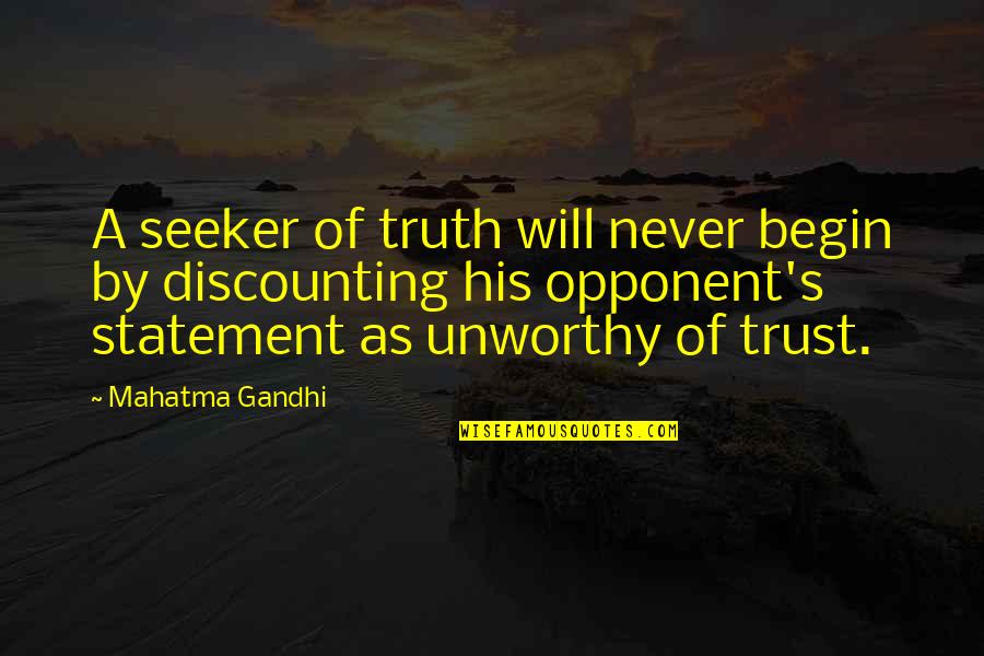 Truth Seeker Quotes By Mahatma Gandhi: A seeker of truth will never begin by